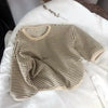 A beige and black striped kids cotton pullover sweatshirt laid flat on a white surface.