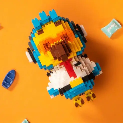 A Minecraft-style building block figure resembling a fiery animal with blue and yellow blocks on an orange background.