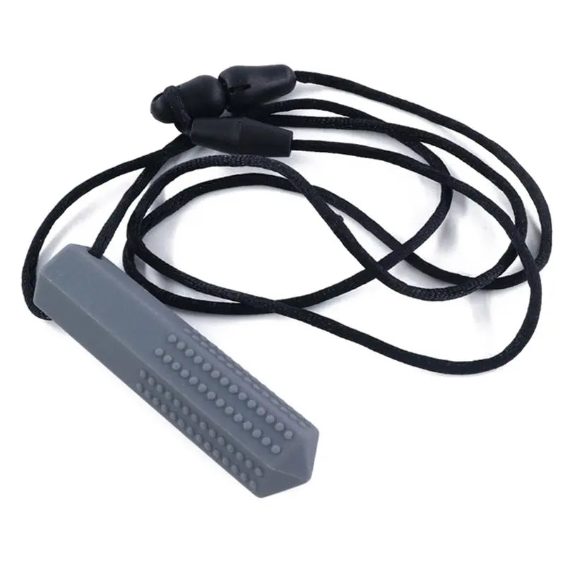 A black silicone chew necklace with a textured silicone piece for teething and sensory calming.