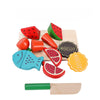 Wooden magnetic fruit and vegetable cutting play set with various colored, shaped pieces.