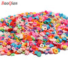 A large pile of colorful soft polymer clay slices assorted for nail art and DIY crafts
