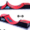 A red finger skateboard park set featuring ramps and a board with black and gray components.
