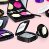 A collection of various makeup products including palettes and compacts shown on a pink background.