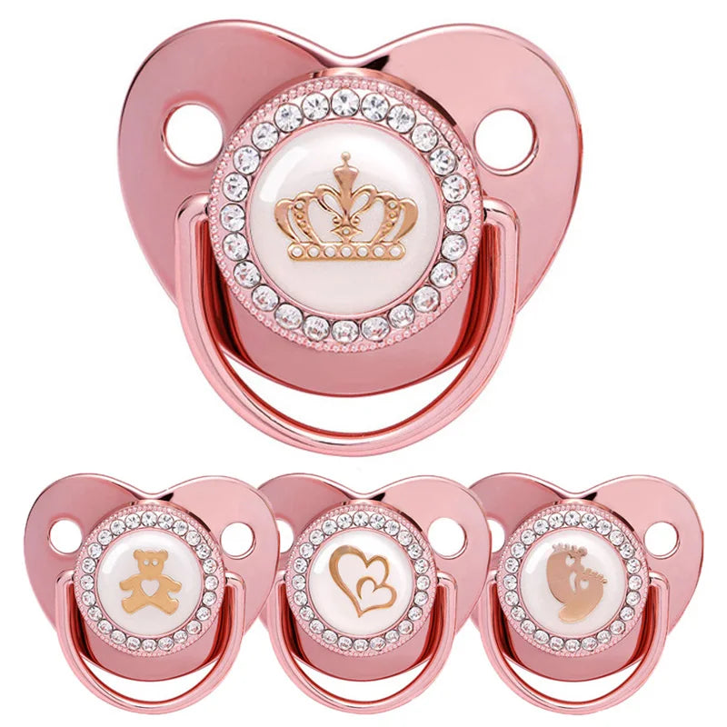 Rose gold crystal bling pacifiers for newborns featuring a crown and heart designs
