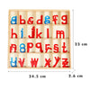 A wooden Montessori alphabet box containing red and blue letter cards arranged in a grid.