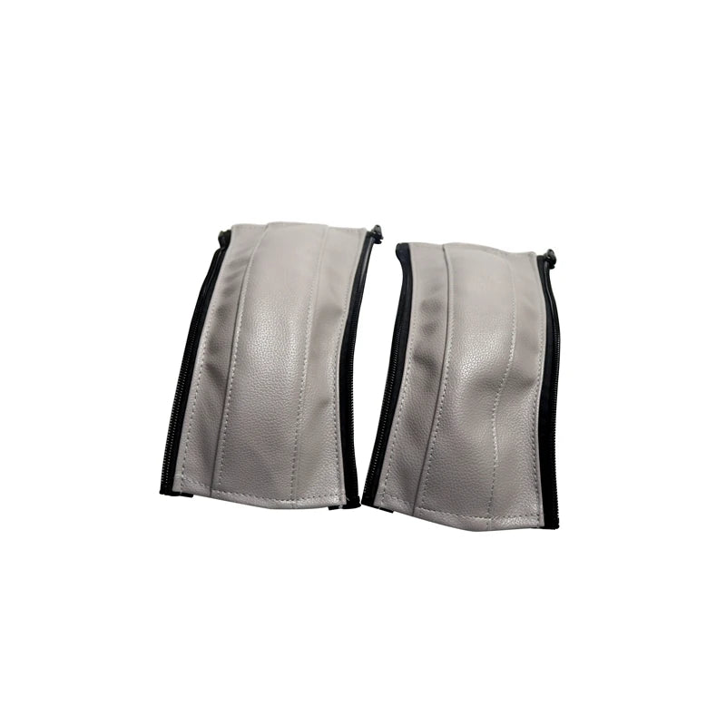 A pair of light gray leather stroller handle covers designed for a protective and comfortable grip.