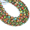 A close-up of a strand of natural sea sediment jasper and turquoise beads for jewelry making