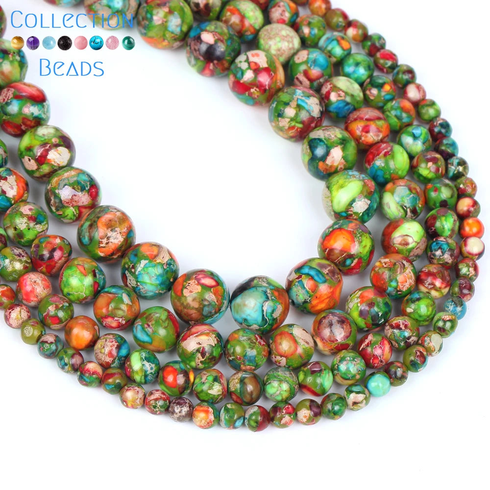 A close-up of a strand of natural sea sediment jasper and turquoise beads for jewelry making