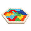 A wooden tangram puzzle board with colored hexagonal pieces arranged in an octagonal shape.