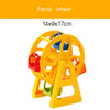 Yellow Ferris wheel toy with a wooden train track accessory set.