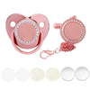 A pink sublimation-ready baby pacifier and clip set with rhinestone accents shown next to several white silicone pacifier tip