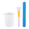 A set of reusable silicone resin mixing tools including a measuring cup and stir sticks in white, yellow, and blue.