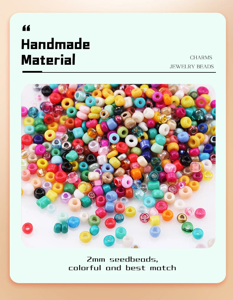 A colorful assortment of 2mm glass seed beads in various shades and sizes for DIY jewelry making.