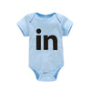 Light blue letter print cotton baby bodysuit with black 'in' text