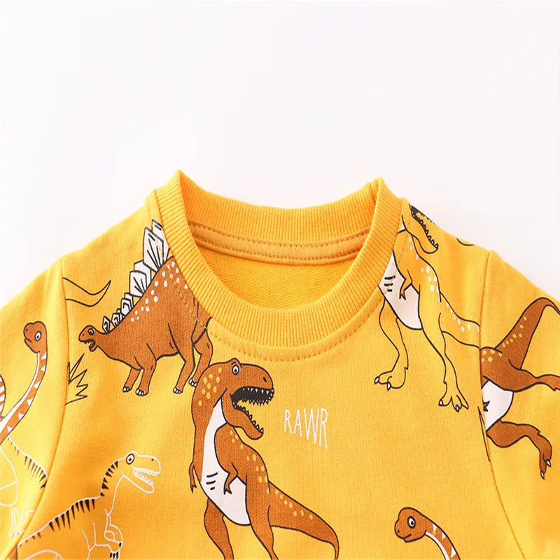 A yellow kids dinosaur print pullover sweatshirt featuring various dinosaur illustrations.