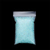 A clear plastic bag filled with light blue iridescent glass bubble beads for crafting.