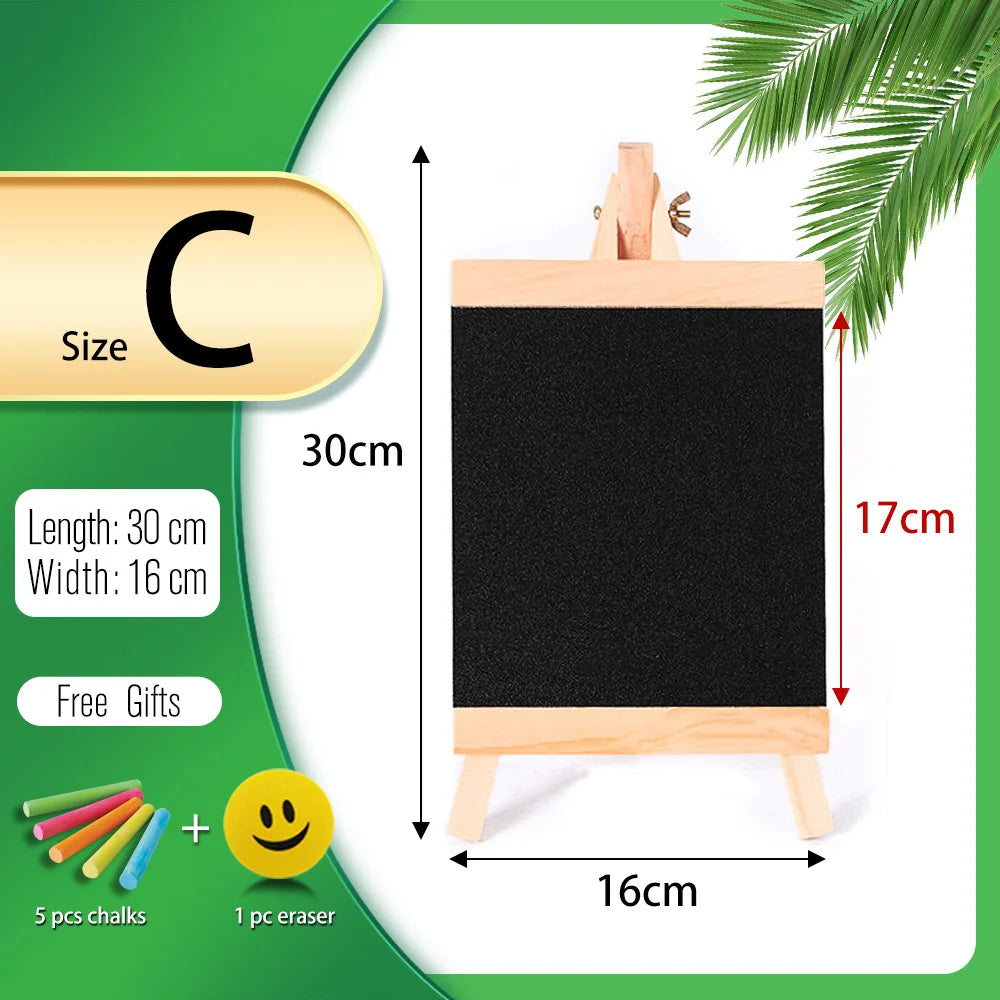 Mini wooden chalkboard easel with a black board, chalks, and an eraser, displayed on a white background.