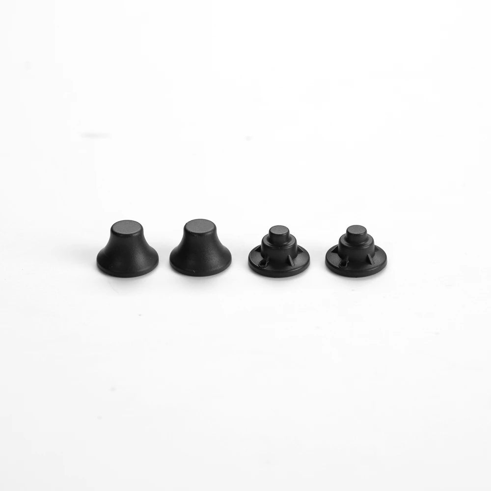 A set of black 1:12 scale RC car steering wheel and interior upgrade parts.