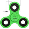 A green ABS tri-spinner fidget toy with black rings, measuring 2.9 inches long.