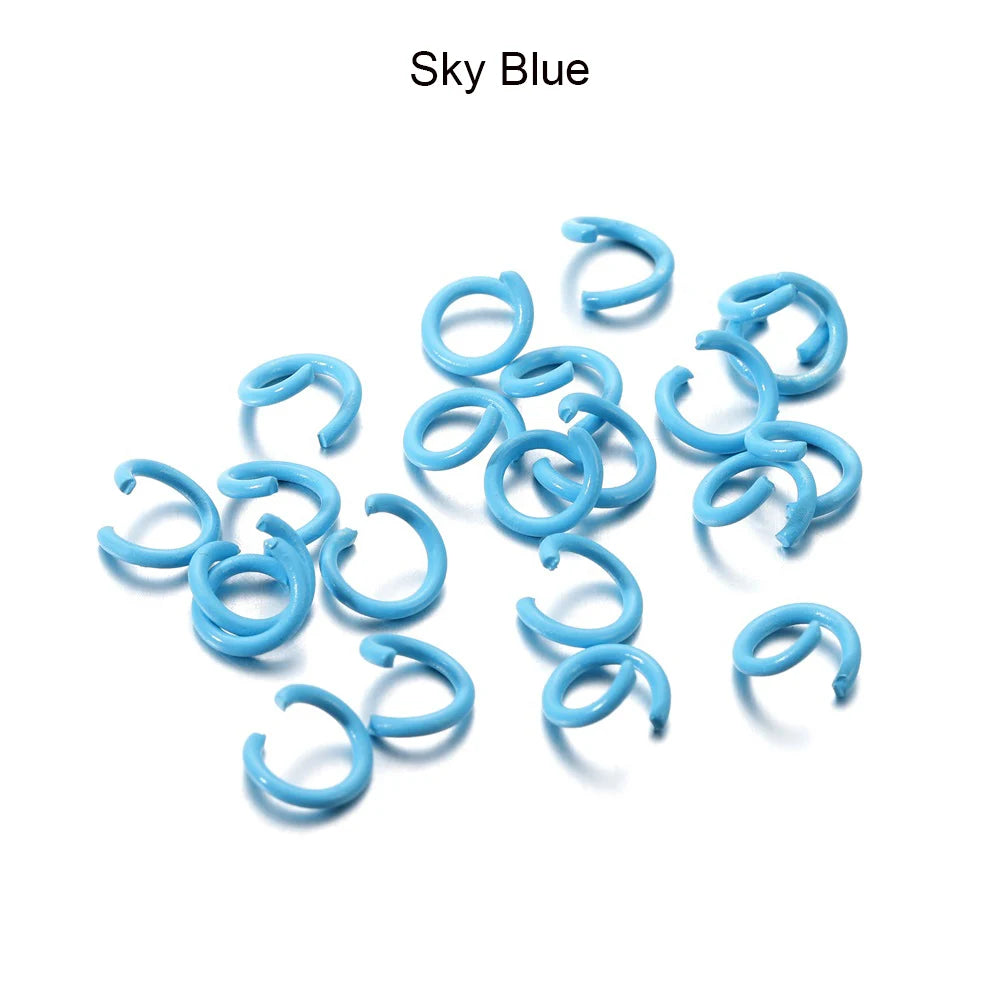 A collection of sky blue metal open jump rings for DIY jewelry making
