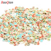 Assortment of colorful soft polymer clay slices for nail art and DIY crafts