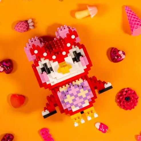 A red and pink building block set featuring an animal character with white and yellow accents on an orange background.