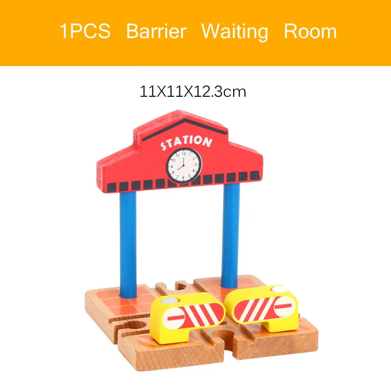 A wooden train track accessory set featuring an airport and gas station scene with a station sign and fuel pump.