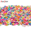 Assortment of colorful soft polymer clay slices for nail art and DIY crafts