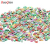 Assortment of soft polymer clay slices in various colors and leaf shapes for nail art and DIY crafts