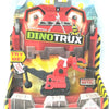 A Dinotrux toy truck and dinosaur figures packaged in a cardboard box.