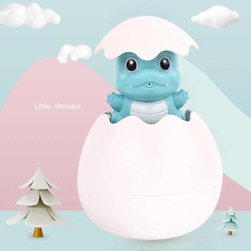 A cute blue dinosaur toy in a white egg with surrounding clouds and a small green tree.