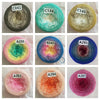 A collection of various colored cake yarn spools, including C041, C124, C145, A298, B247, A291, A293, A294, and A287.