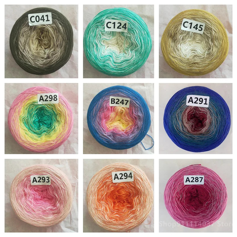A collection of various colored cake yarn spools, including C041, C124, C145, A298, B247, A291, A293, A294, and A287.