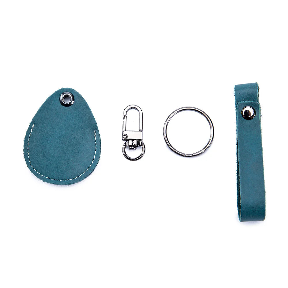 A teal leather key wallet featuring a card holder and a leather strap with a metal clasp.
