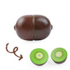 A set of magnetic wooden fruit and vegetable cutting toys, including a brown apple and a green lime.