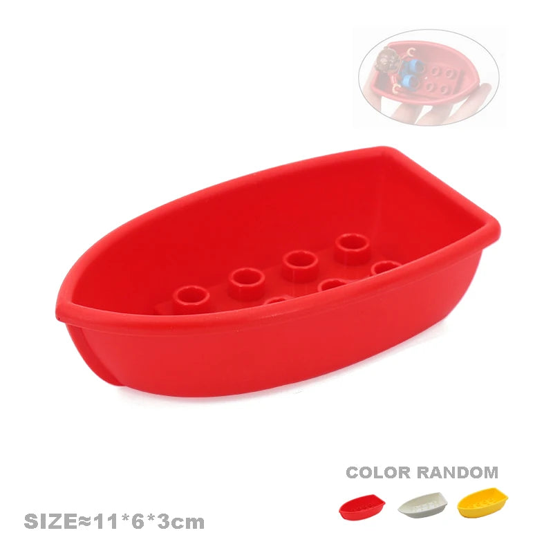 Red plastic building block tray with multiple circular holes for city traffic vehicles