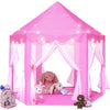 A pink kids castle play tent with lights and a stuffed animal inside.