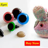 A crocheted rabbit toy featuring multi-colored plastic safety eyes.