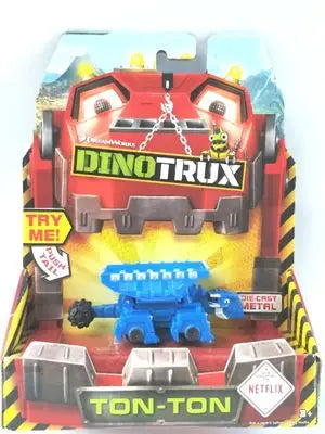 A DinoTrux dinosaur truck toy car with removable dinosaur figures displayed in its packaging.