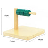 A wooden Montessori sensory toy set featuring a light wood base and a green cylindrical piece with a wooden handle.
