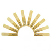 A pack of ten bamboo clarinet reeds with strength 2.5 arranged in a semi-circle.