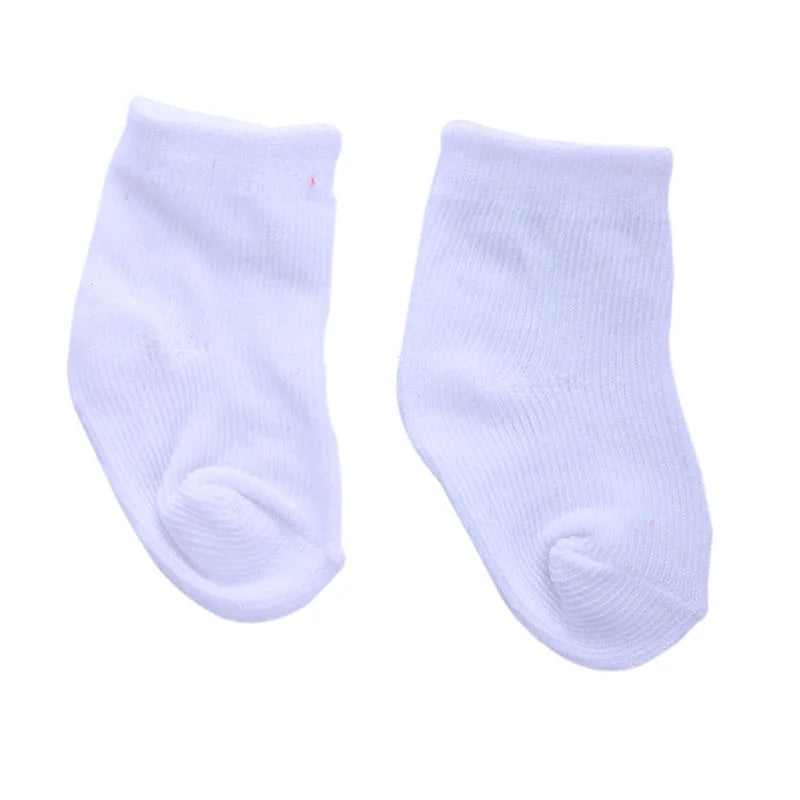 A pair of white knitted socks for dolls