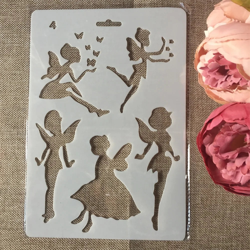 A sheet of white stencil featuring various silhouette designs of fairies and winged figures for crafting.