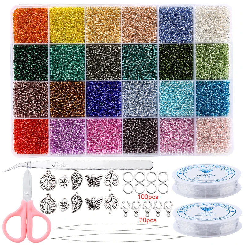 A collection of 24 colors of glass seed beads in various shades and sizes, along with a pair of pliers and storage containers