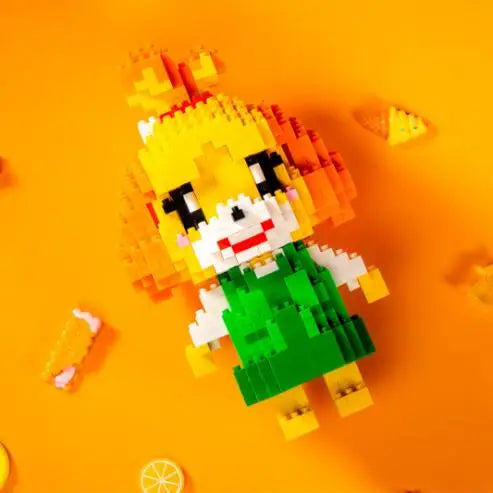 A colorful building block figure resembling a yellow animal with orange accents and a green outfit against an orange backgrou