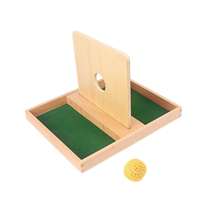 A wooden Montessori sensory toy set featuring a wooden board and a yellow foam ball.