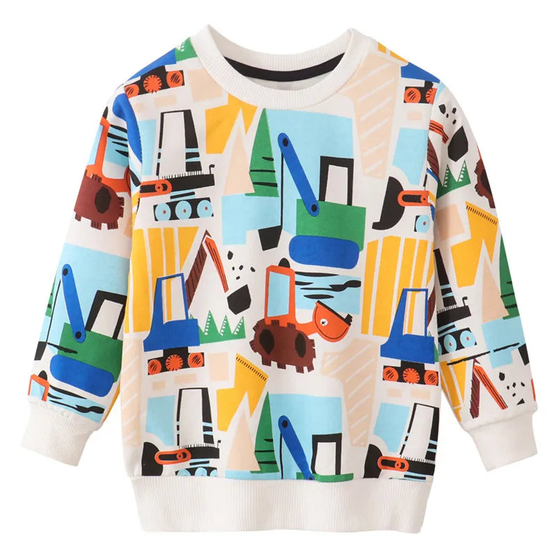 A colorful pullover sweatshirt featuring a pattern of various dinosaur and construction vehicles.