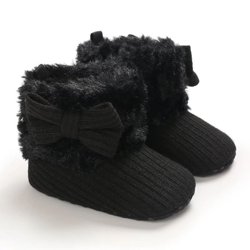 Black plush baby snow boots for girls and boys with a fuzzy trim and anti-slip sole