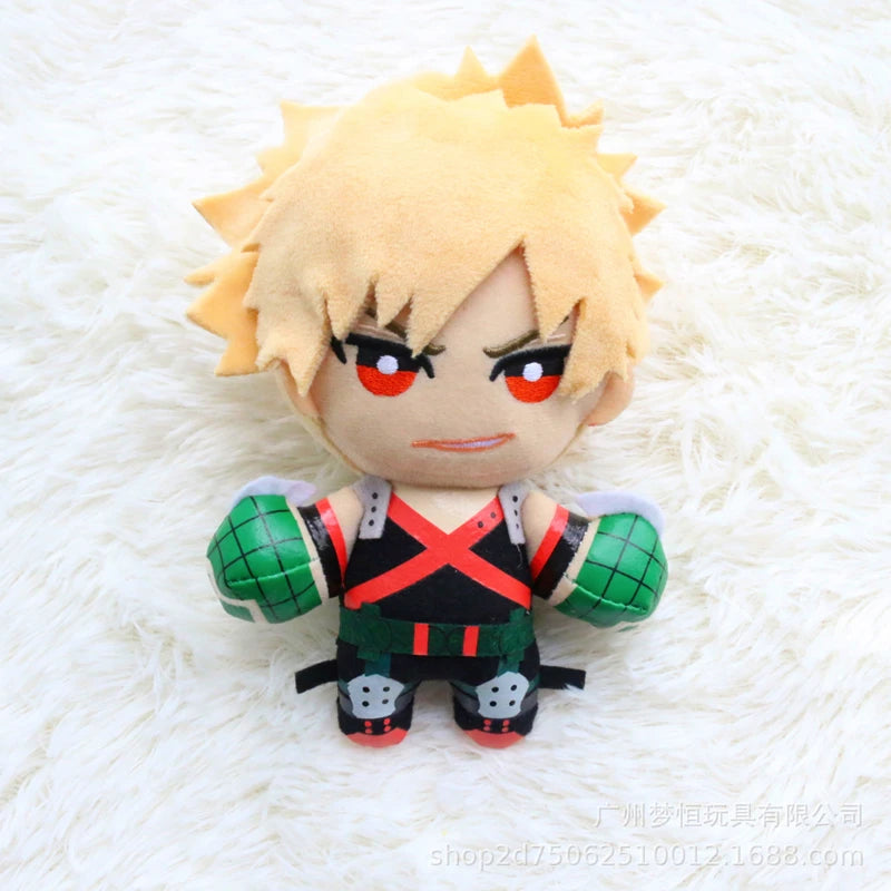 A plush figure of a spiky blonde anime character with red eyes and green accents.