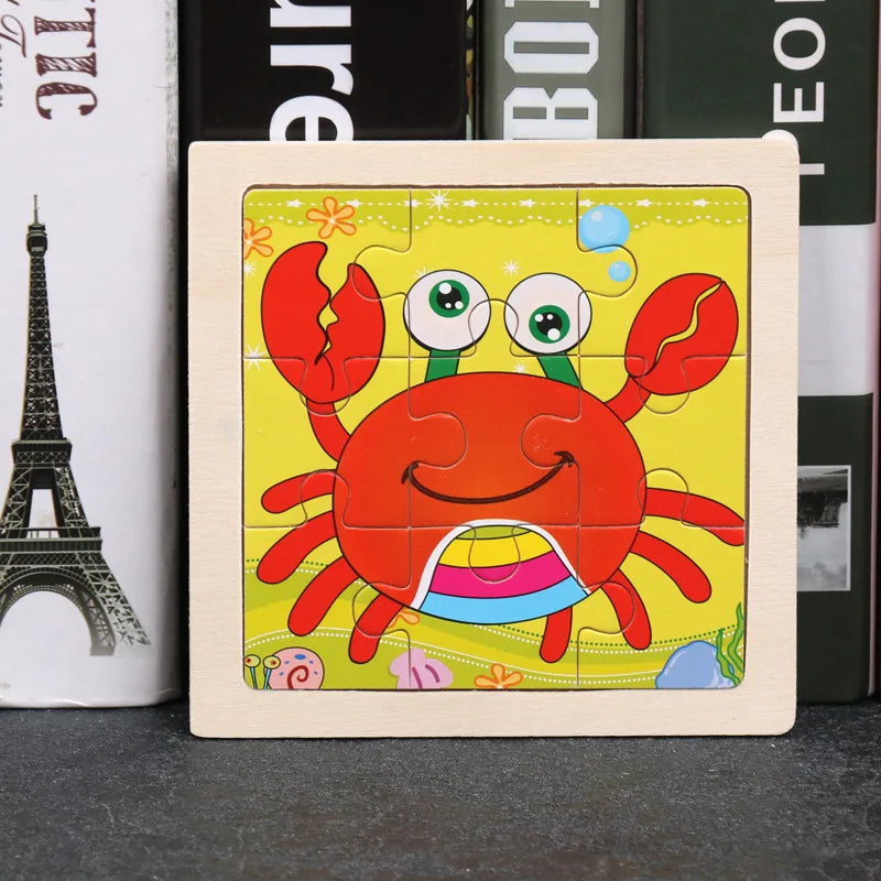 A wooden puzzle featuring a bright orange crab design on a yellow background.
